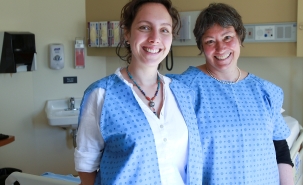 Noémi Marquis and Denyse Roy each try on half of their creation: the DUO hospital gown
