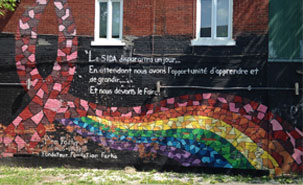 Mural at the corner of Wolfe and Ste-Catherine Streets, which displays a quote by Ron Fahra, who set up a foundation for men, women, and children living with HIV/AIDS. Courtesy Gabriel Girard, University de Montréal.